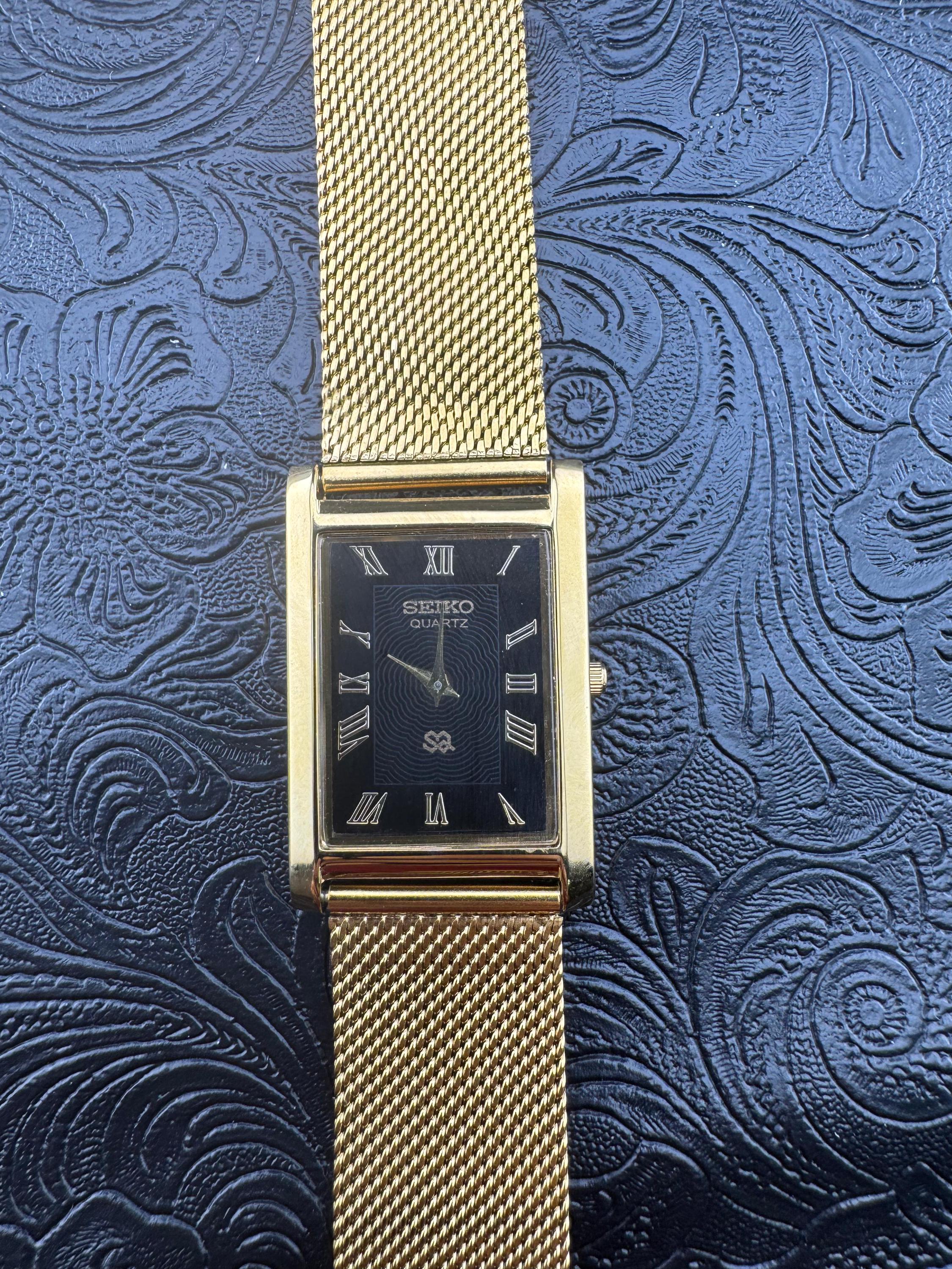 Seiko Black and Silver/Gold Tone Vintage Minimalist  Watch Vintage Seiko Quartz Watch: Slim Rectangle Gold Tone, Black  main image 4