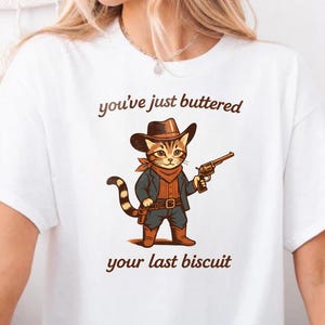 You&#39;ve Just Buttered Your Last Biscuit Shirt | Funny Cowboy Cat Tee | Meowdy Partner Meme Shirt | Graphic Tee for Cat Lovers