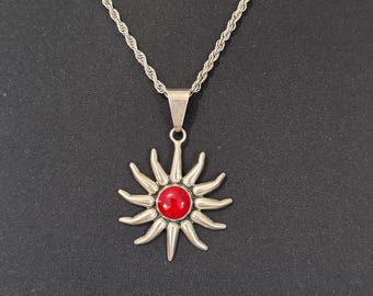 Sterling silver, red jasper, sunburst necklace. Made in Ttax on, Mexico. Included is an 18” sterling silver chain.
