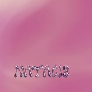 May include: The name Natalie is spelled out in silver letters on a pink background.
