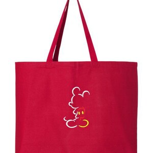 May include: A red tote bag with long straps. The bag features a white outline of Mickey Mouse with red shorts and yellow shoes. The bag is made of a durable fabric and is suitable for carrying various items.