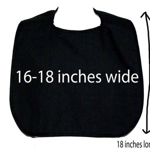 May include: Black fabric bib measuring 16-18 inches wide and 18 inches long.