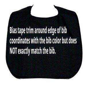 May include: Black bib with white text that reads "Bias tape trim around edge of bib coordinates with the bib color but does NOT exactly match the bib."