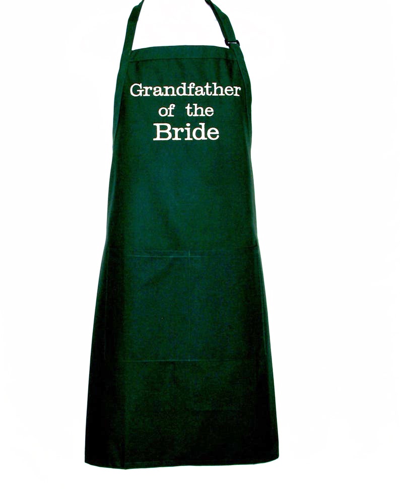 May include: A dark green apron with white text that reads "Grandfather of the Bride".