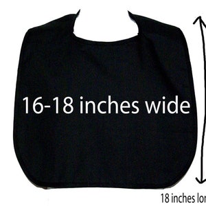 May include: Black fabric bib measuring 16-18 inches wide and 18 inches long.