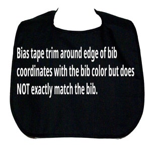 May include: Black bib with white text that reads "Bias tape trim around edge of bib coordinates with the bib color but does NOT exactly match the bib."