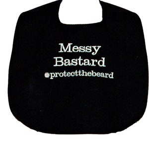 May include: Black bib with white embroidery that reads "Messy Bastard #protectthebeard".