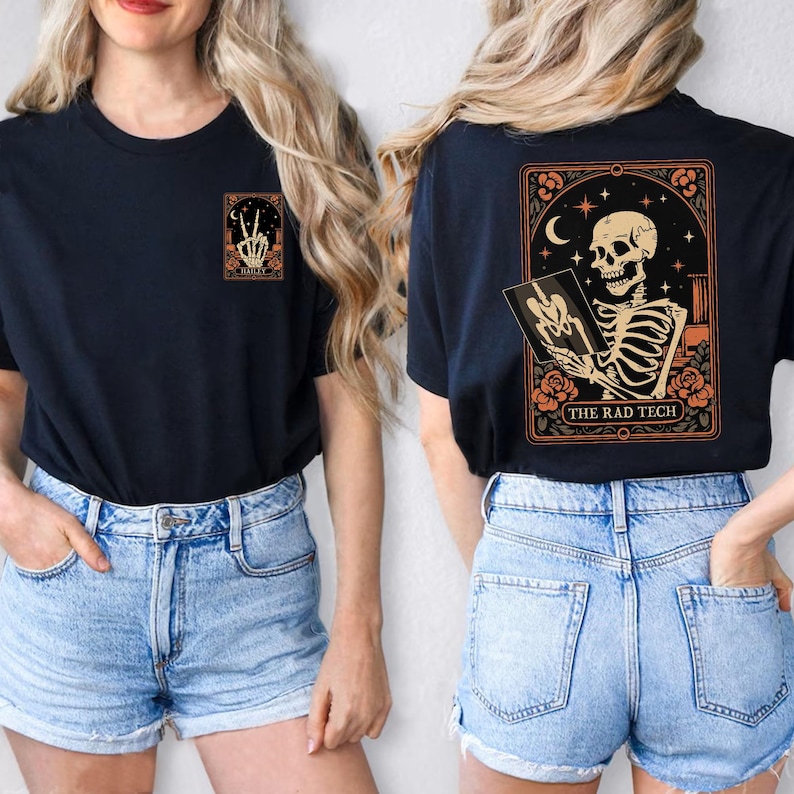 A unisex orange shirt for radiology technologists featuring Halloween skeleton art, stars, and floral frames. The print says “THE RAD TECH” and highlights the spooky yet fun spirit of Halloween. Perfect for hospital staff or medical imaging professionals.