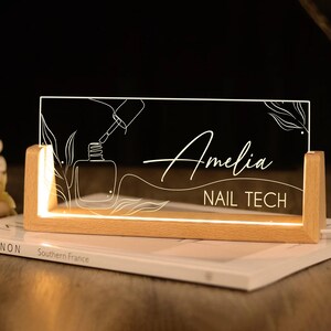 Custom acrylic desk name plaque for nail technicians, featuring stylish personalization and durable design. Ideal as a Christmas gift, birthday present, or salon décor for nail stylists and beauty experts.