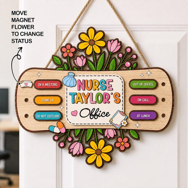 May include: A wooden hanging sign shaped like a bandage with floral accents, featuring the text 'NURSE TAYLOR'S Office' and a movable magnet flower to indicate status. Options include 'IN A MEETING', 'COME IN', 'DO NOT DISTURB', 'OUT OF OFFICE', 'ON CALL', and 'AT LUNCH'.