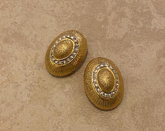 Diane von Furstenberg Gold Tone Clip On Earrings