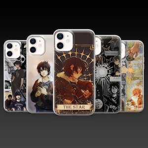 May include: A collection of phone cases featuring character art. The cases display various illustrations, including a figure with the text "THE STAR" and another with the text "Nico smiled". The cases have a glossy finish and are designed for a smartphone.