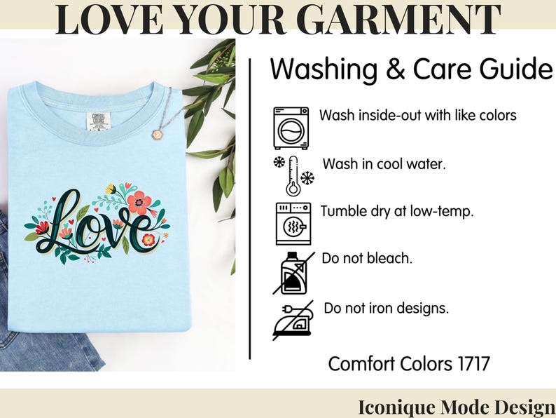 May include: A light blue t-shirt featuring the word Love in black script surrounded by colorful floral illustrations. The image includes a Washing & Care Guide with icons and text: Wash inside-out, wash in cool water, tumble dry low, no bleach, no iron.