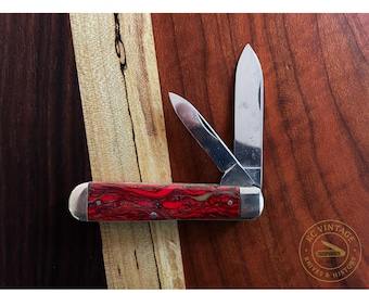 Vintage Seneca Cutlery Co. Two-Blade Pocket Knife – Red Swirl Celluloid – c. 1940s–1950s