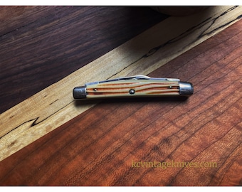 Vintage Queen Stockman Pocket Knife – 1958–1960 – 4 Blade – Orange Streaked Handles – USA Made