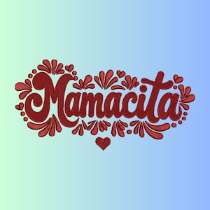 May include: Embroidered design with the word "Mamcita" in a cursive font, surrounded by decorative floral and heart accents. The text and embellishments are in a deep red color, set against a gradient blue and green background.