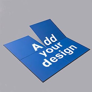 Puede incluir: Un folleto azul plegado con el texto "Add your design" en blanco. El folleto está abierto, mostrando los paneles interiores. El fondo es gris sólido.