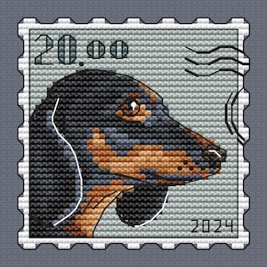 May include: A vintage-style postage stamp featuring a black and tan dachshund dog illustration. The stamp has the text "20.00" and "2029" printed on it.