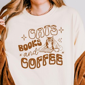 Cats Books and Coffee T-Shirt, Coffee Weather Shirt, Gift for Coffee Lovers, Cat Lover Gift, Book Lover Shirt, Reader Shirt, Bookish Gift