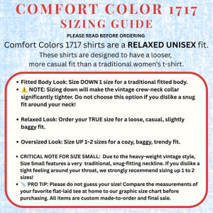 May include: A Comfort Color 1717 sizing guide infographic with a light blue background. The text outlines fit options for a relaxed unisex shirt, including instructions for fitted, relaxed, and oversized looks, plus a note on the crew-neck collar.
