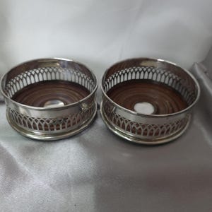 vintage silver plated bottle coasters