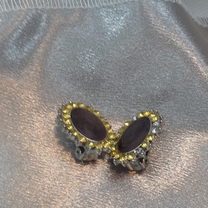 Woman&#39;s clip-on earrings, silver tone vintage rhinestone jewellery