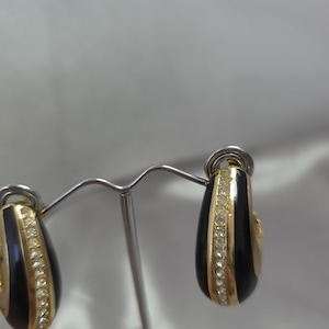 vintage Christian Dior pave rhinestone clip on earrings gold tone