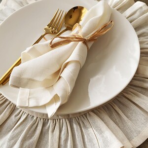 Lifestyle shot featuring washable placemats in dining room setting, fabric placemats enhance everyday meals and holiday entertaining