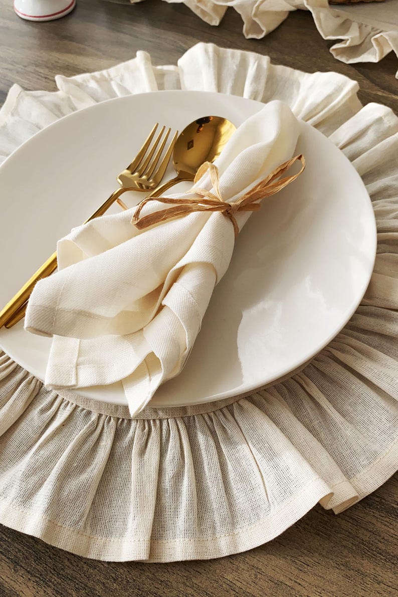 Lifestyle shot featuring washable placemats in dining room setting, fabric placemats enhance everyday meals and holiday entertaining