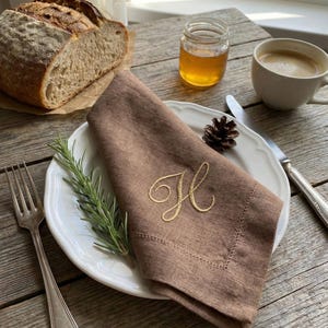 Embroidered napkins featuring elegant monogrammed linen, luxury linen napkins, personalized napkins with initial napkin design, cloth dinner napkins perfect as wedding gift, custom linen napkins, customized napkins, monogrammed napkins, linen dinner napkins, wedding napkins, monogram napkins