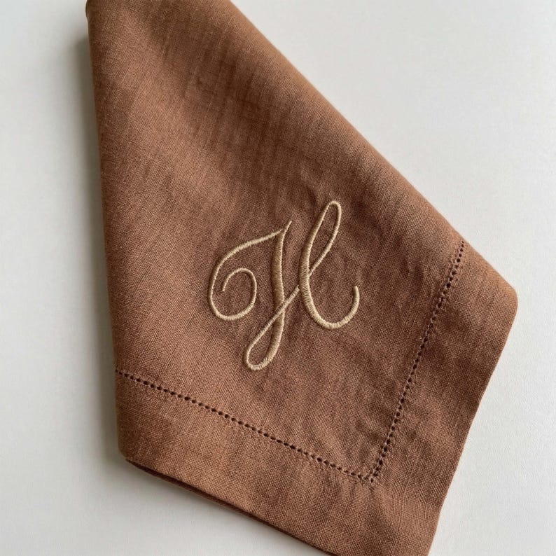Embroidered napkins featuring elegant monogrammed linen, luxury linen napkins, personalized napkins with initial napkin design, cloth dinner napkins perfect as wedding gift, custom linen napkins, customized napkins, monogrammed napkins, linen dinner napkins, wedding napkins, monogram napkins