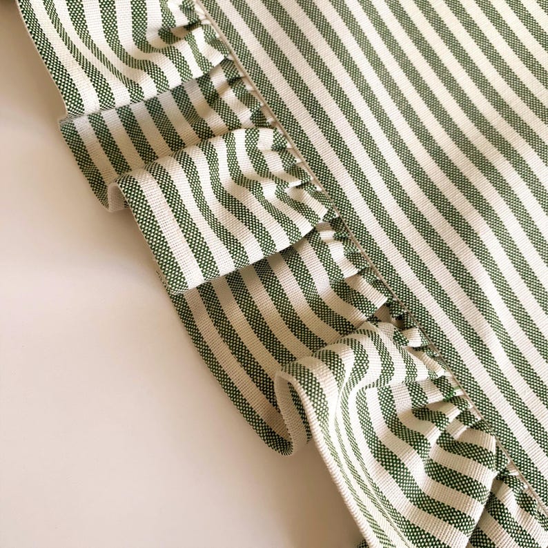 French tablecloth style runner with distinctive ruffle detail, transforms dining spaces with European farmhouse elegance.