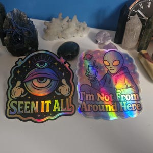 Cosmic Duo - Holografisches Alien & Allsehendes Auge Sticker Pack | Lustige Trippy Aufkleber für Wasserflaschen, Laptops, Journals
