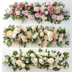 May include: Three floral arrangements featuring a variety of flowers in shades of pink, white, and cream, with green foliage. The arrangements include roses, hydrangeas, and other decorative blooms, suitable for weddings or home decor.