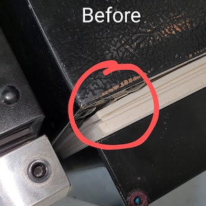 May include: Close-up of a black refrigerator door with a white seal. The seal is damaged and has a gap between the door and the refrigerator. The text "Before" is written above the image.