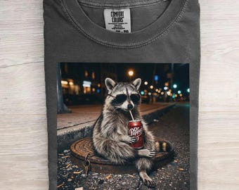 Cool Raccoon Graphic Tee, Fun Animal Lover Shirt, Vintage Raccoons Dr Pepper shirt, Funny Meme Genz Dank Raccoons Shirt, Funny Raccoon Tee