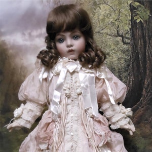 Bebe Bru artist reproduction doll in fabulous silk costume human wig and antique eyes