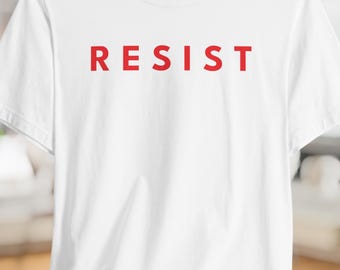 Camiseta gráfica Resist: jersey de algodón unisex