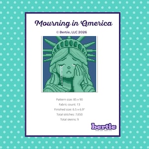 May include: A cross-stitch pattern titled "Mourning in America" showing a pixelated Statue of Liberty with tears. The pattern details include size, fabric count, finished size (16.5 x 17.5 cm), total stitches, and skeins.