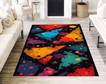Tapis géométrique abstrait à motif triangulaire coloré, style moderne et contemporain, pour salon.