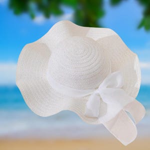 Zonnehoed met brede rand: elegante witte strik, uv-bescherming