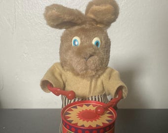 Russ Windup Rabbit Playing Drum