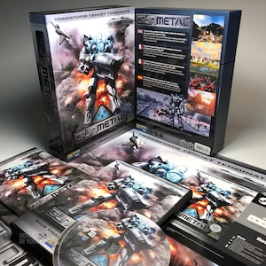 Puede incluir: Videojuego en caja "Gun Metal" con un robot futurista en la portada. La caja negra muestra "Transform Target Terminate". Se ven varios discos y folletos del juego, con ilustraciones similares.