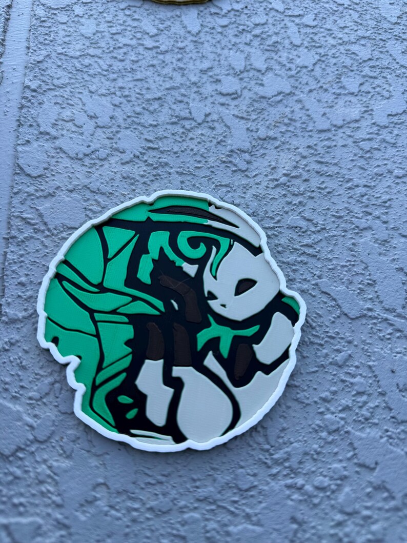 Round Eeveelution coaster Leafeon in cute Pokemon anime art.