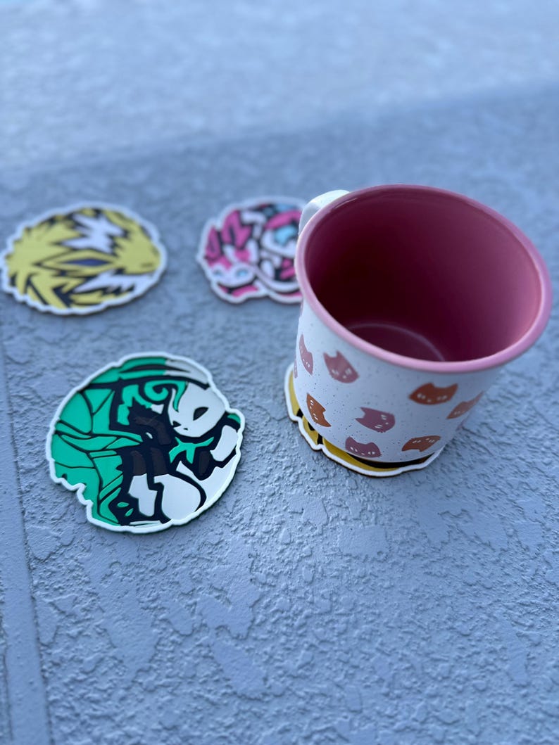Round Eeveelution coaster set featuring Jolteon, Sylveon, Leafeon, Flareon in cute Pokemon anime art.