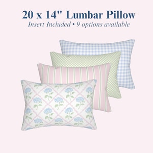 May include: Four rectangular lumbar pillows measuring 20 x 14 inches, including an insert. The designs feature a blue gingham check, a green gingham check, pink and white vertical stripes, and a white fabric with blue hydrangea floral patterns.
