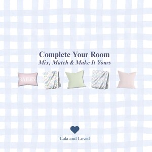 May include: Five decorative throw pillows arranged in a row against a light blue gingham background. The text reads Complete Your Room Mix, Match & Make It Yours and Lala and Loved. The pillows include a pink one with the name BAILEY, a floral print, a solid light green, a blue floral pattern, and a solid light pink pillow.