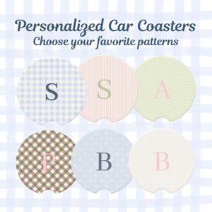 May include: Six circular car coasters featuring various patterns including blue gingham, pink and green stripes, light green check, brown gingham, light blue polka dots, and white dots. Each coaster displays a large centered letter: S, S, A, P, B, B.