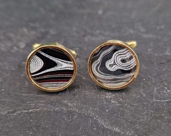 Cufflinks with fordite insert and epoxy resin coating
