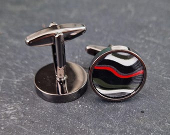 Cufflinks with fordite insert and epoxy resin coating